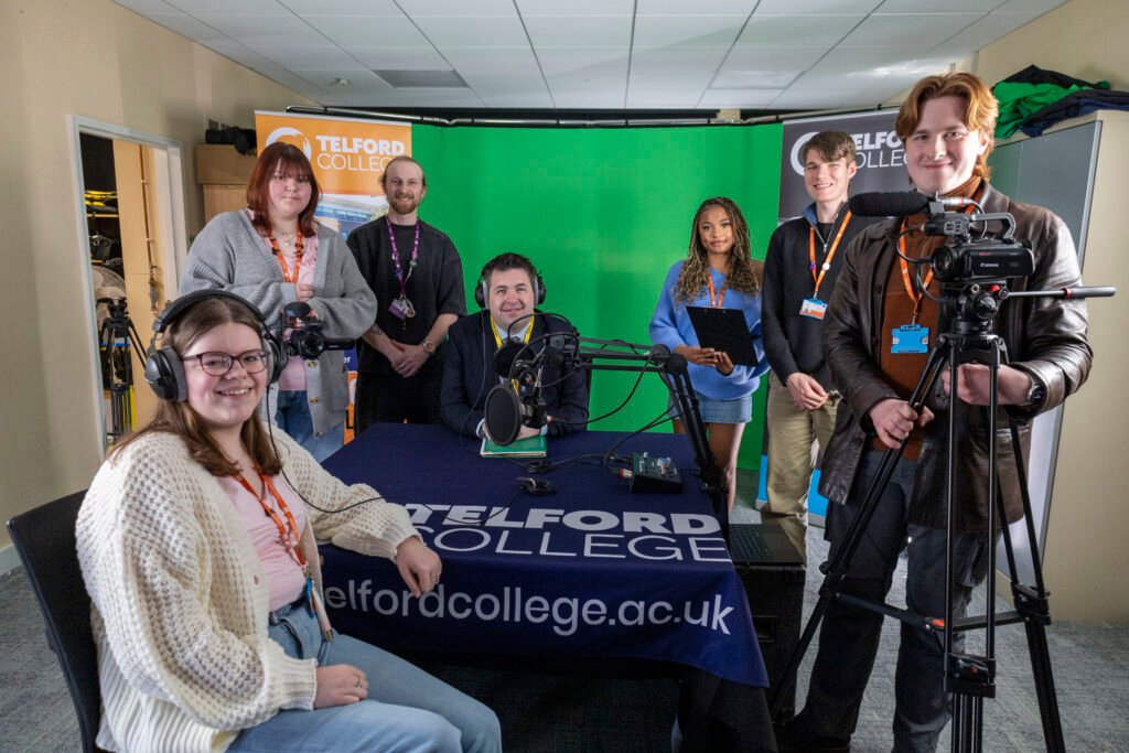 Shaun is photographed with media students following his hotseat interview at the college.