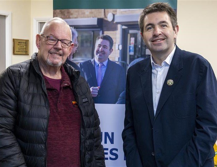 Shaun Davies MP with a resident at the event.