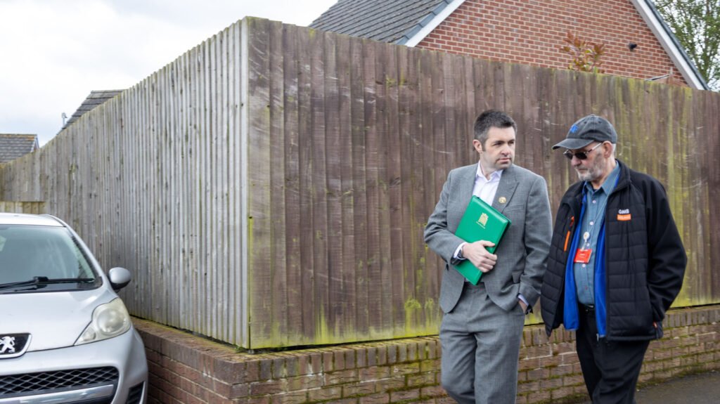 Shaun Davies MP with Borough Cllr Arnold England on a Ward Walk around Brookside