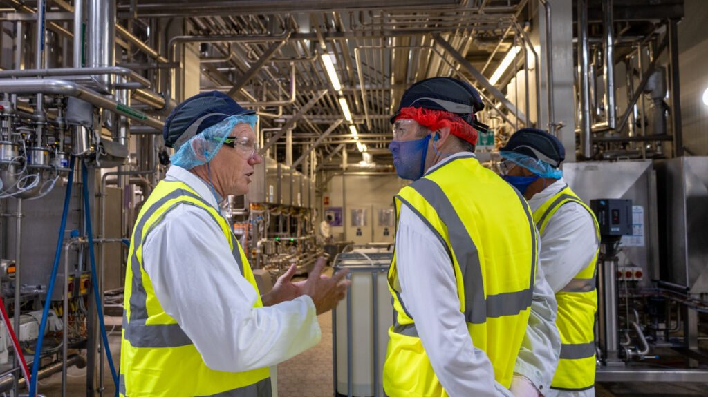 Shaun Davies MP having a tour of the Müller factory
