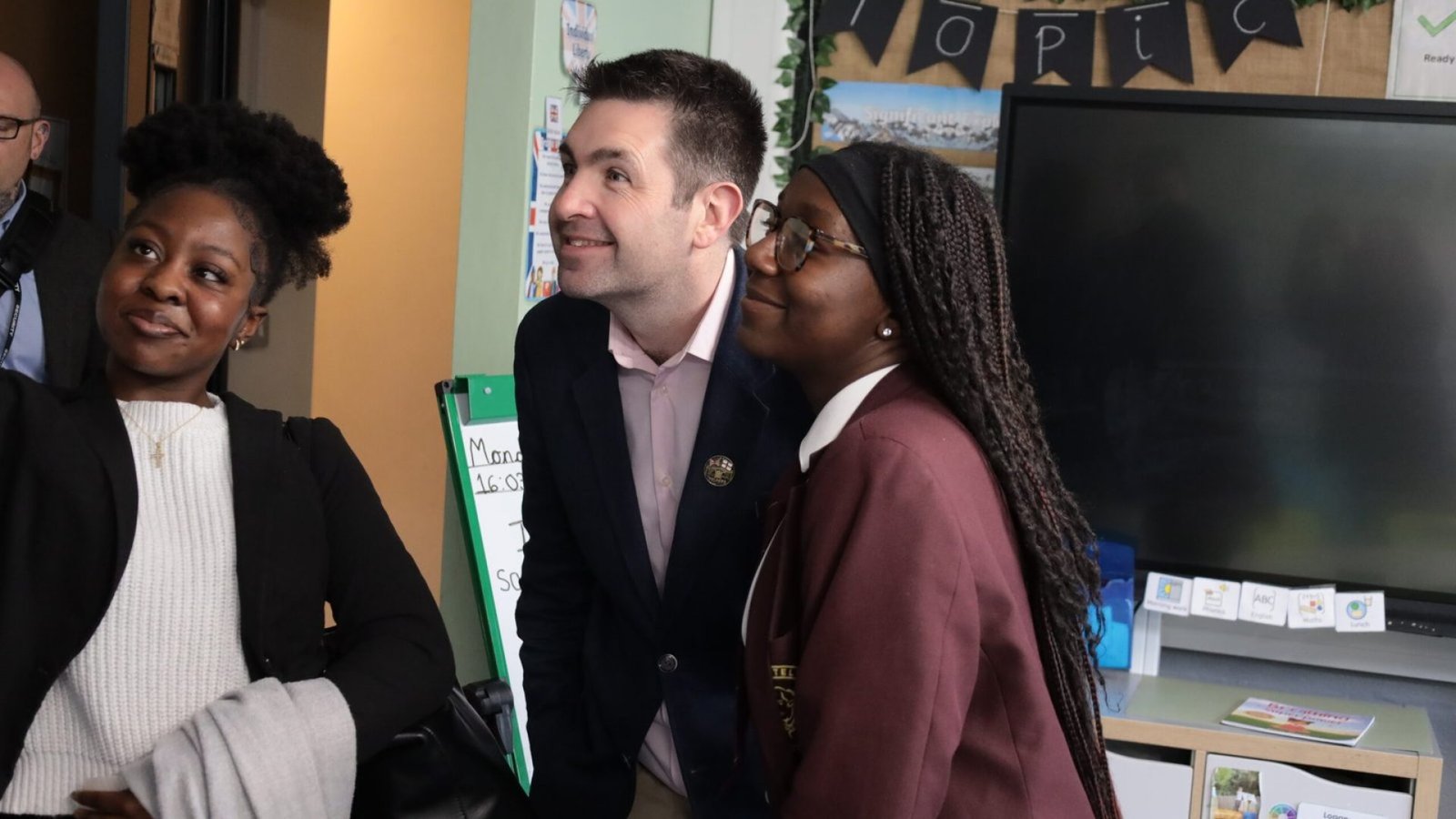 Shaun taking a selfie with students
