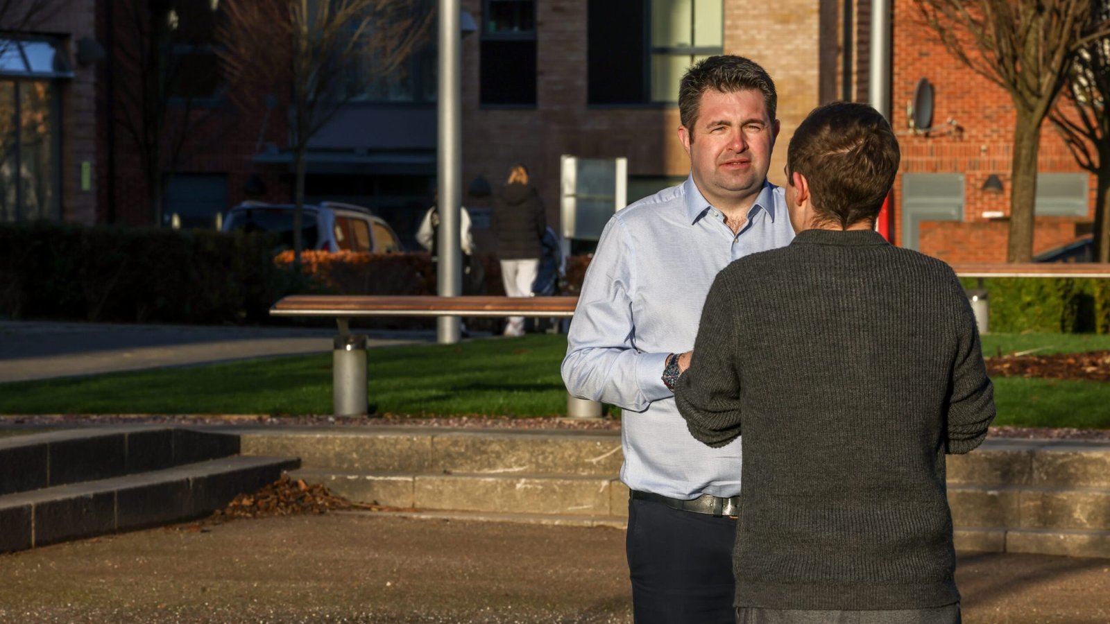 Shaun Davies - MP for Telford, speaking to a resident.